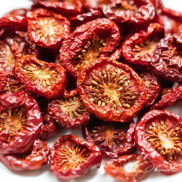 A pile of sun-dried tomato halves