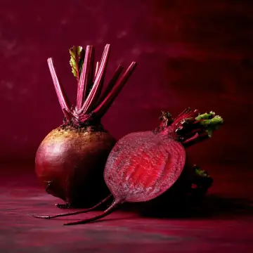 Beetroots, one cut in half